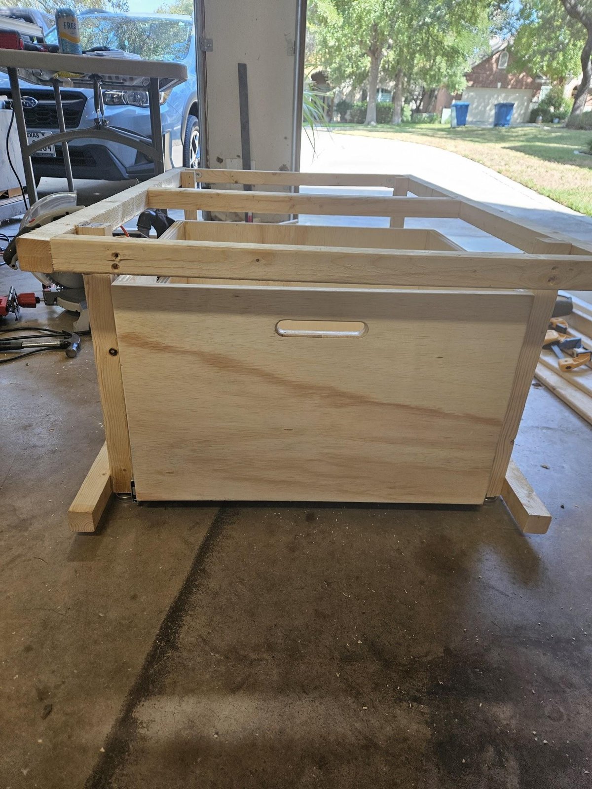 The Panel A frame from the front with the drawer closed, showing a hand-hold slot cut through the drawer front